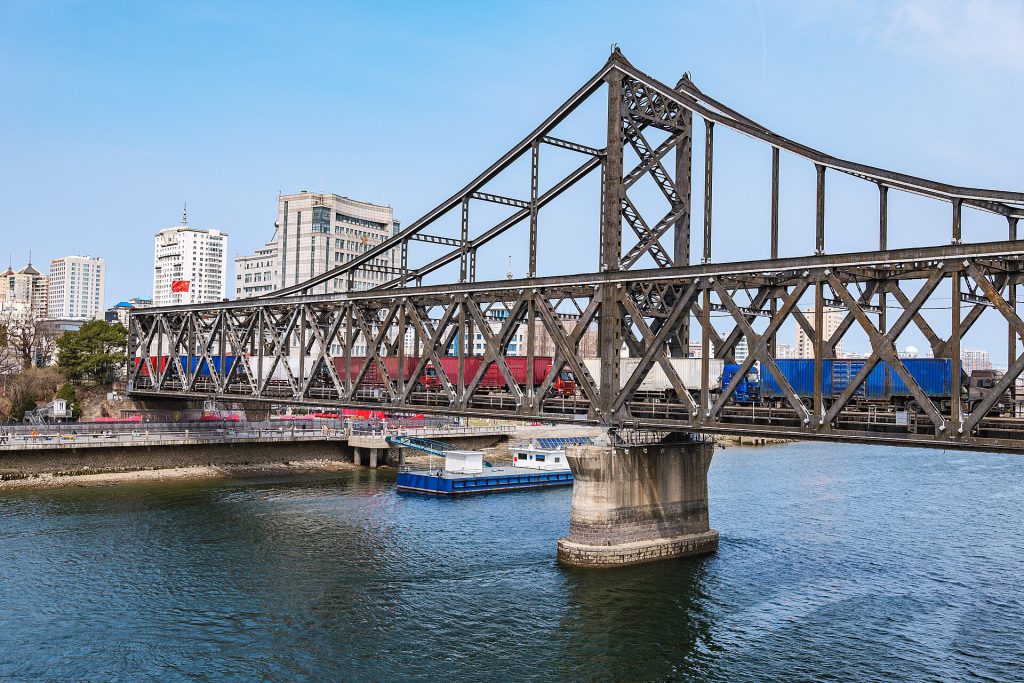 Cargo trucks crossing the Sino Korean Friendship Bridge