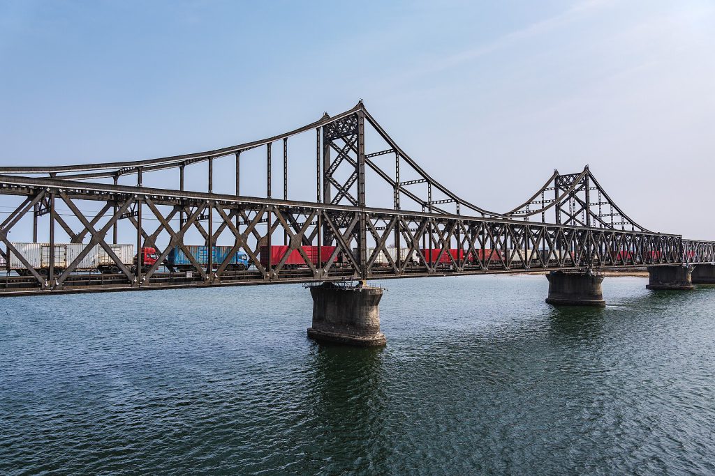Cargo trucks crossing the Sino Korean Friendship Bridge