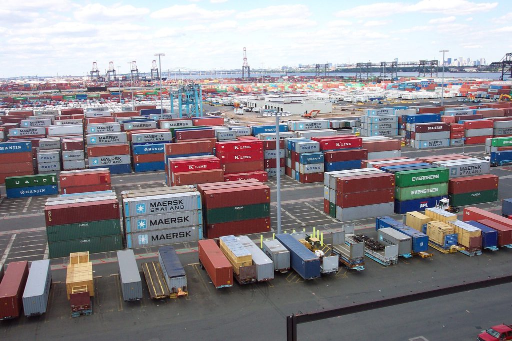 Container ships at a busy Chinese port illustrating export growth