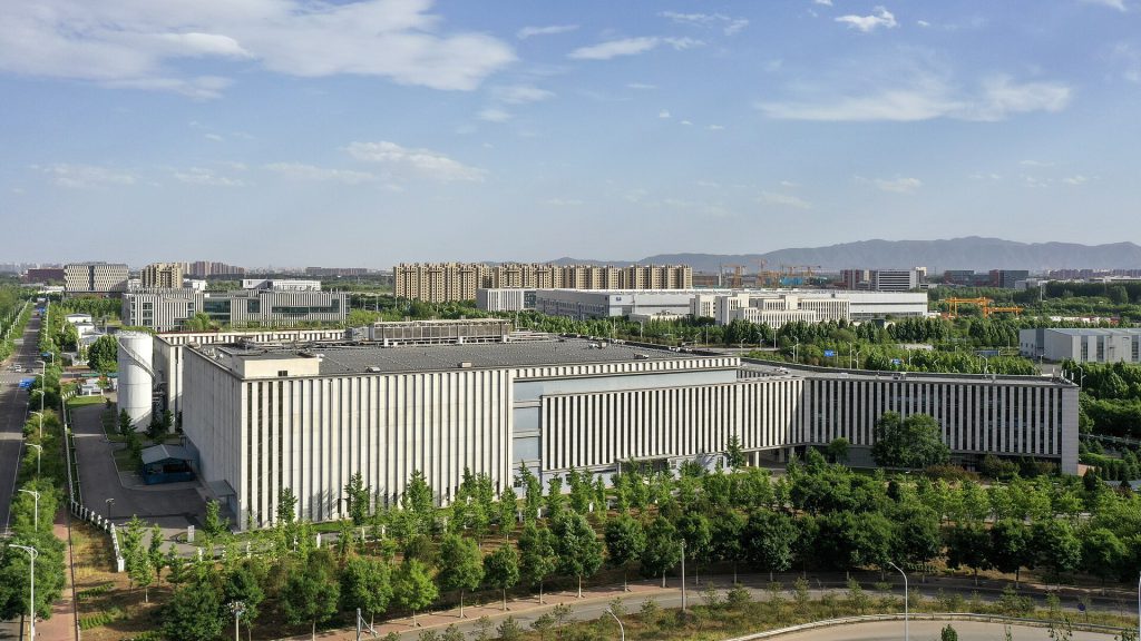 Server racks in a modern data center representing China's AI export boom