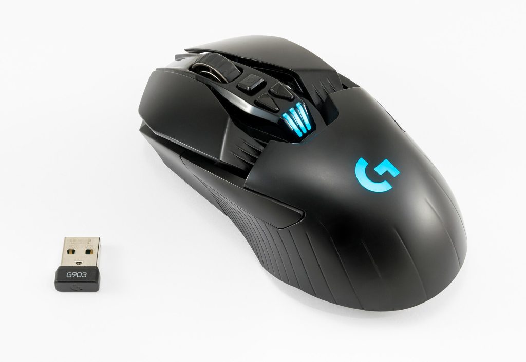 Computer mouse and keyboard on a desk representing counter-strike 2 cheating detection
