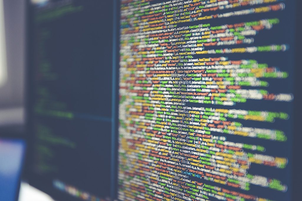 Code on computer monitor (Unsplash)