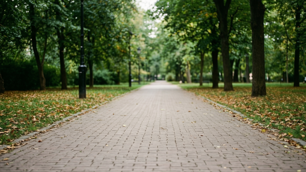 Person walking briskly in a park for Parkinson's disease exercise benefits