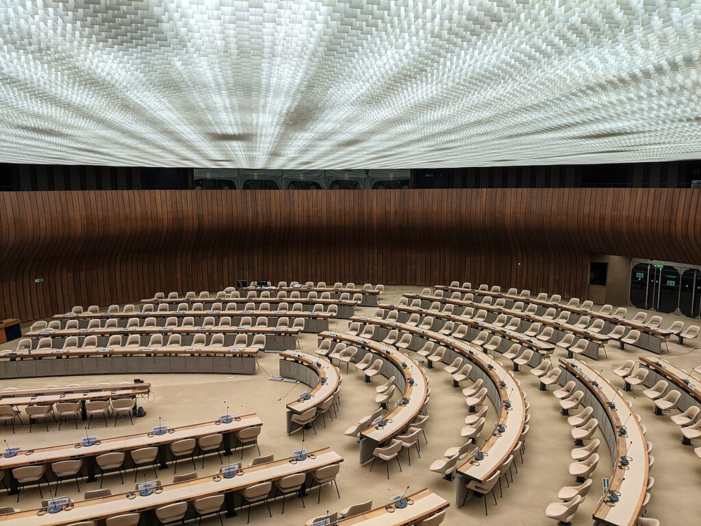 Why Global Cooperation Is the Only Way to Manage AI Risks 3 United Nations Geneva conference room