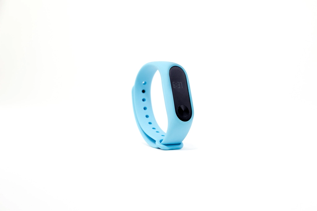 Blue fitbit fitness tracker