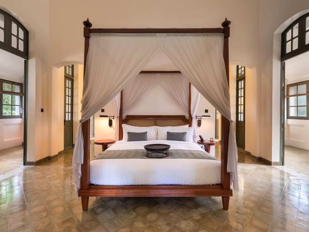 Hotels and Restaurants Ban Influencers to Protect Guest Privacy 3 Canopy bed of Amantaka Suite in Amantaka luxury Resort & Hotel in Luang Prabang Laos