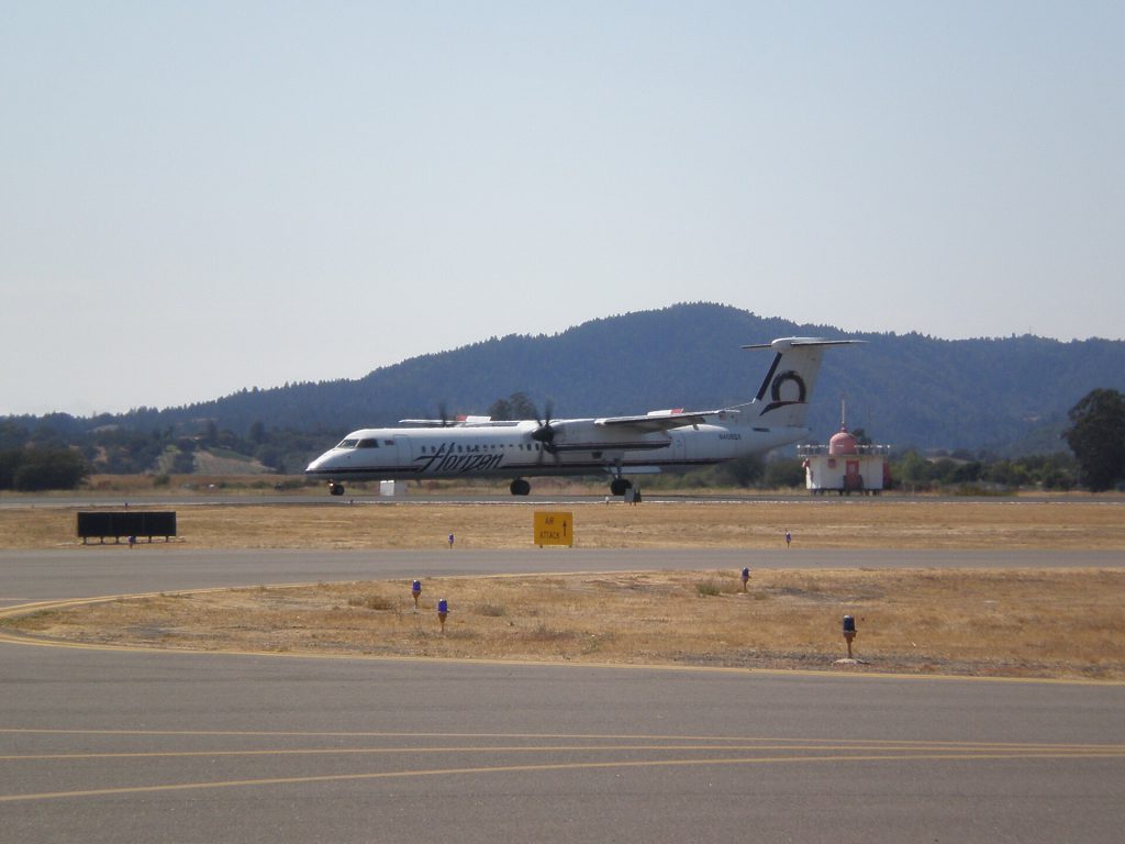 Motorcoach parked at Sonoma County Airport terminal