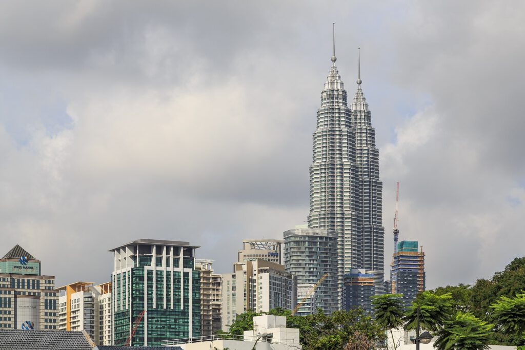 Haze Hits Malaysia Tourism as Year-End Targets Fade Haze covering Kuala Lumpur skyline with Petronas Twin Towers