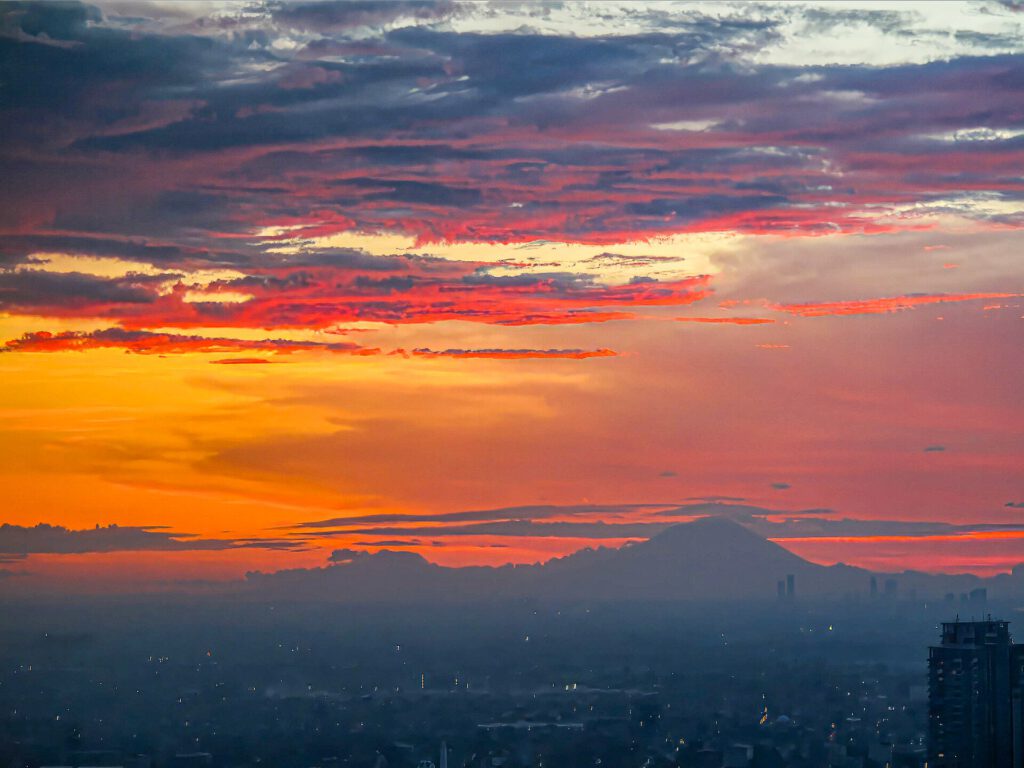 Haze Hits Malaysia Tourism as Year-End Targets Fade 2 Dawn colours over Jakarta, Indonesia