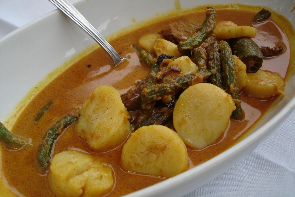 Indian Chef Maunika Gowardhan Shares Two Coconut Curry Recipes 3 Coconut Curry Scallops