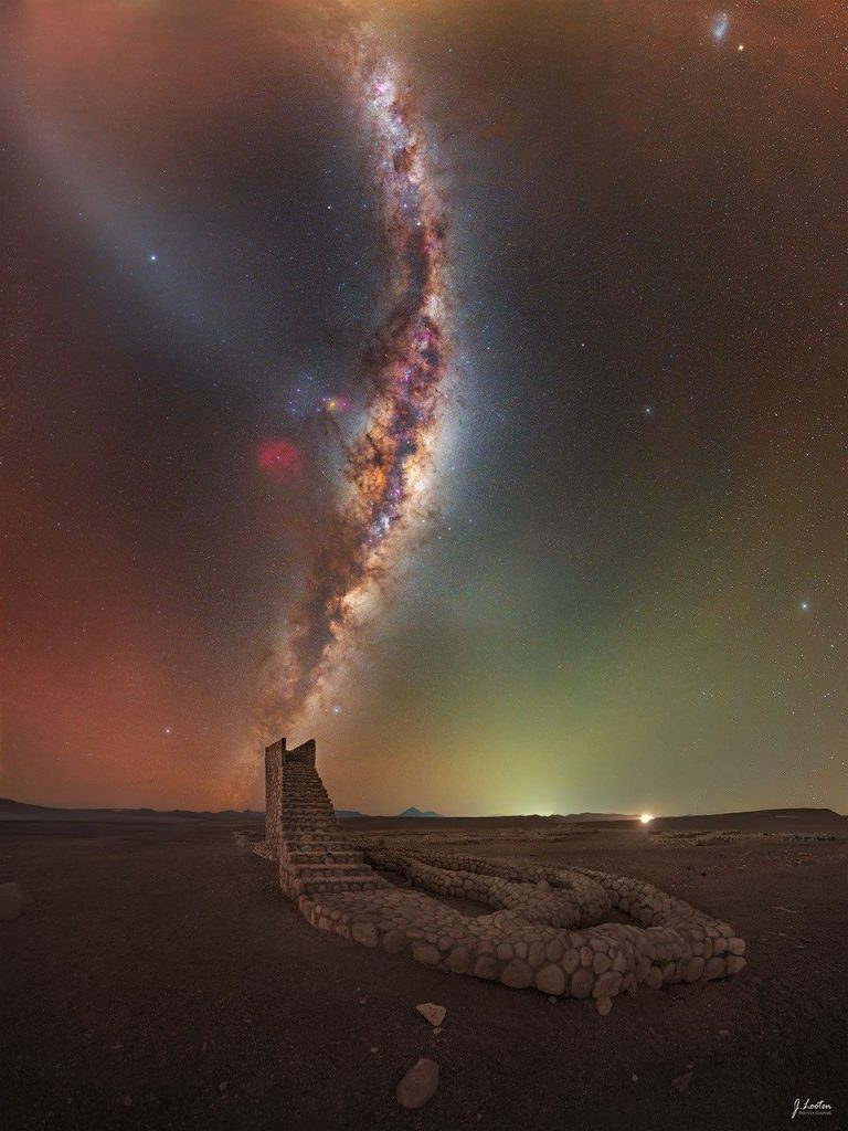Desert Staircase sculpture in the Atacama Desert with the Milky Way and Small Magellanic Cloud in the night sky