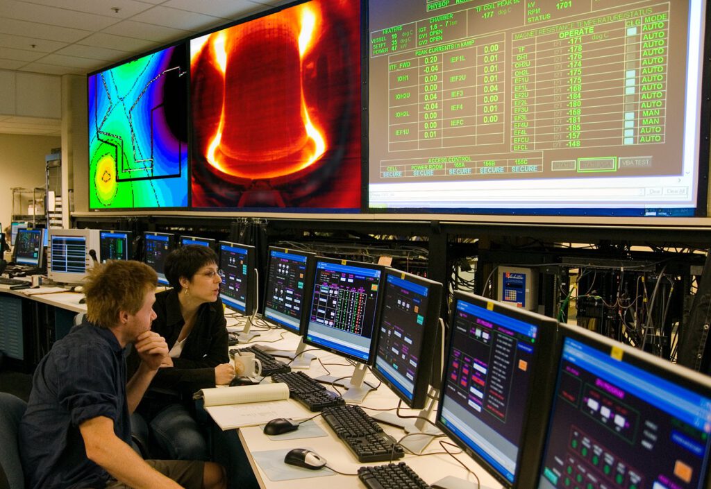 Alcator C Mod graduate students in control room