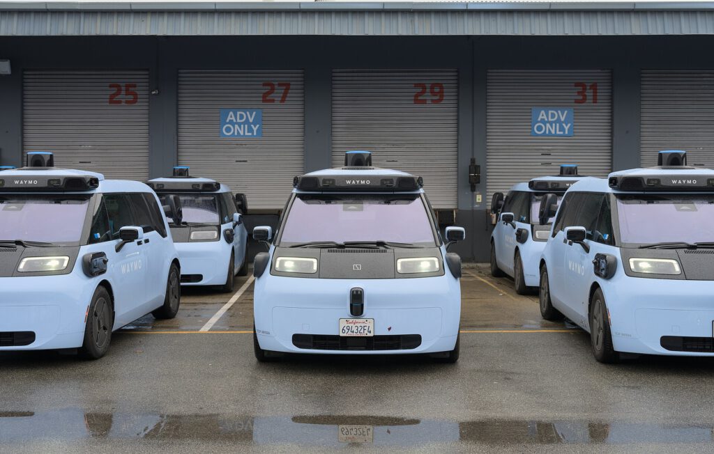 NHTSA Proposes Cyan Lights for Driverless Cars Cyan marker lights on a futuristic autonomous vehicle