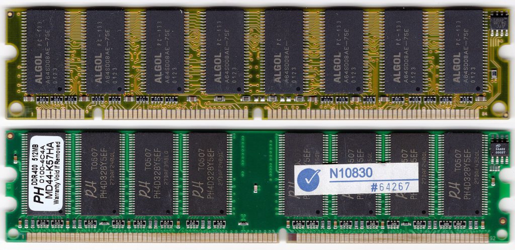 Stacks of computer memory modules and circuit boards representing the chip shortage affecting PC shipments