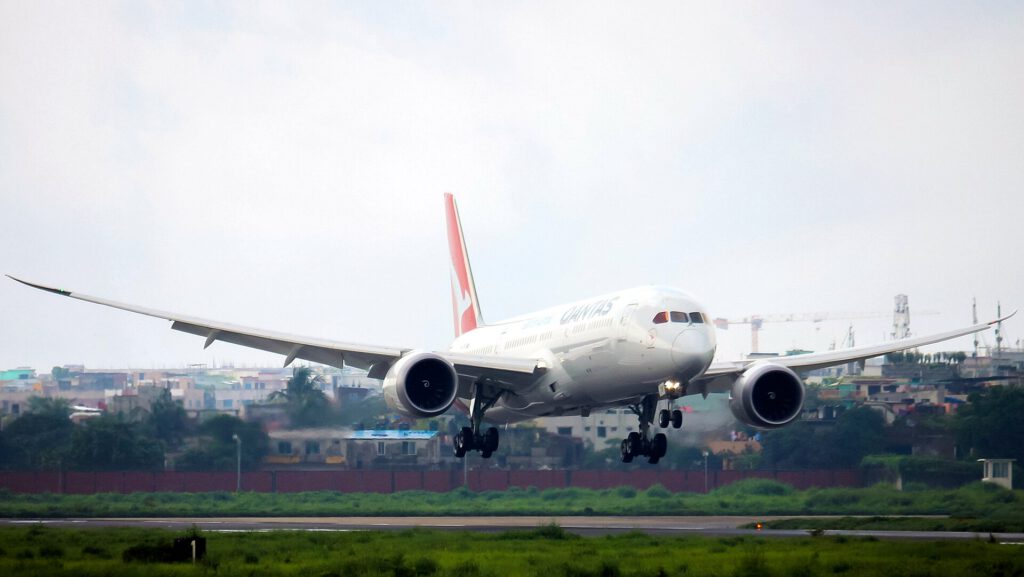Qantas Boeing 787 Dreamliner parked at Sydney airport terminal