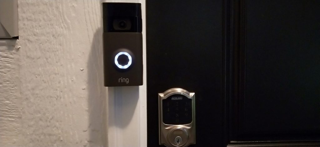 Ring Smart Lock with manual power dial on a door