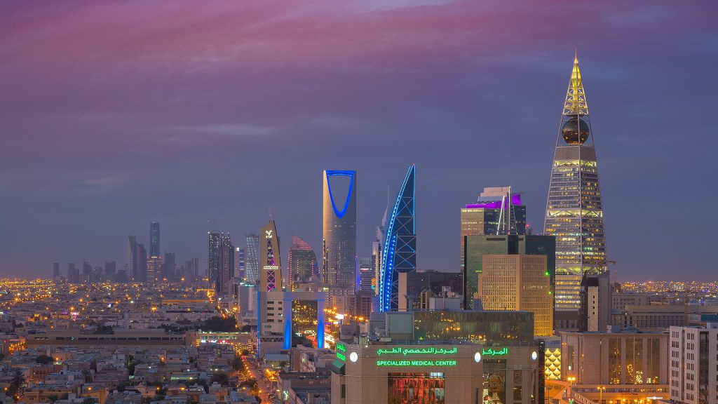 Riyadh airport terminal exterior with Saudi tourism branding
