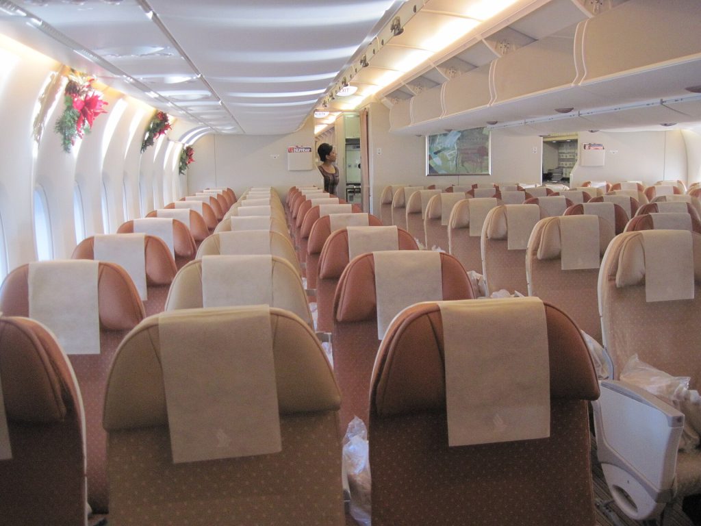 Singapore Airlines Leads 2026 World’s Best Economy Class Rankings Singapore Airlines economy class cabin interior with rows of seats