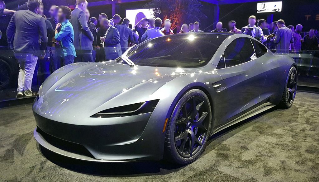 Tesla Roadster upside down on a ramp with cold-gas thruster technology