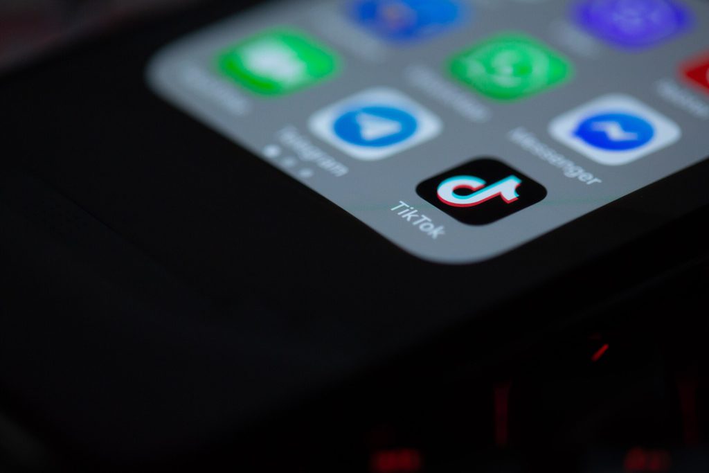Smartphone displaying TikTok AI shopping assistant interface