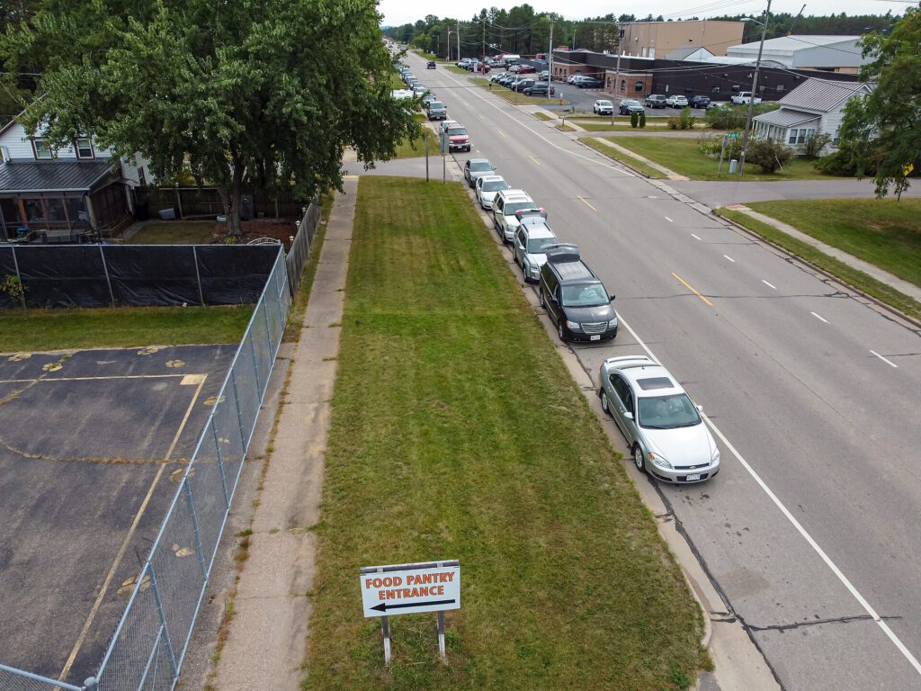 US Food Stamp Enrollment Drops 13% Amid Policy Changes Empty shelves at a local food bank pantry