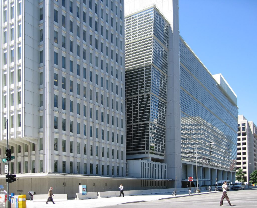 World Bank Pushes Small AI for Developing Economies Small AI models running on a mobile phone in a rural setting