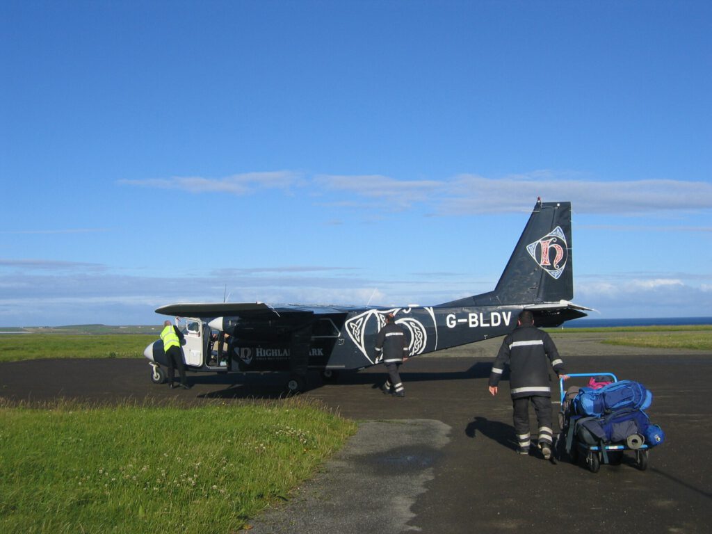 World’s Shortest Flight: 53 Seconds Between Scottish Islands Britten-Norman Islander aircraft on the tarmac at Westray Airport in the Orkney Islands